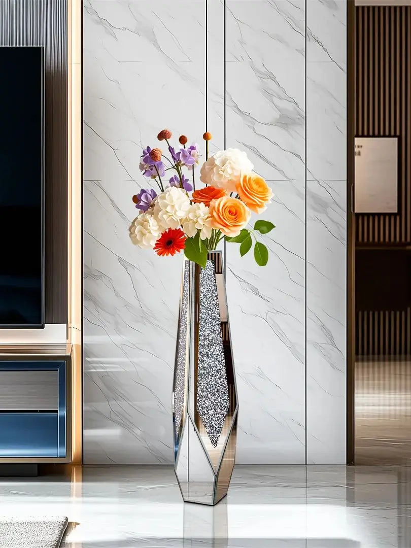 Tall, decorative vase with flowers in a modern interior setting