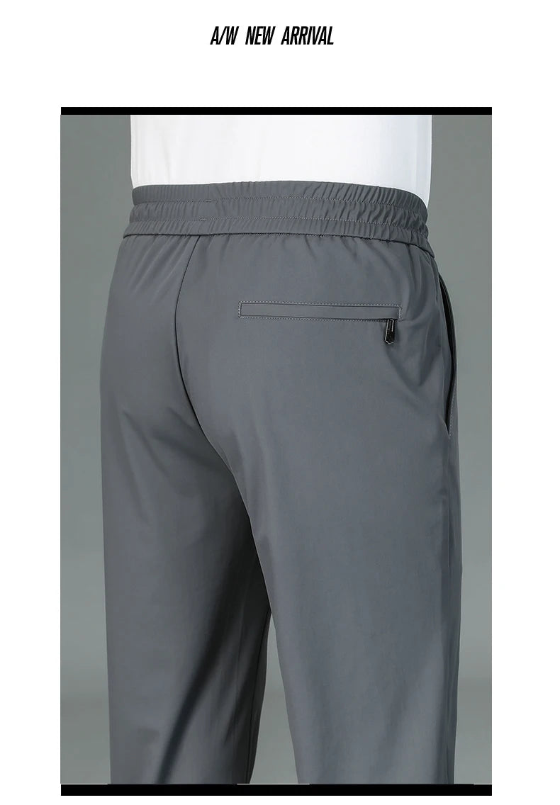 High Quality Ice Silk Stretch New Brand Casual Fashion Strappy Long Pants Elastic Pencil Street Style Teens Trousers Men Clothes