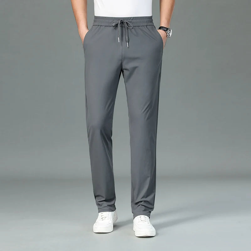 High Quality Ice Silk Stretch New Brand Casual Fashion Strappy Long Pants Elastic Pencil Street Style Teens Trousers Men Clothes