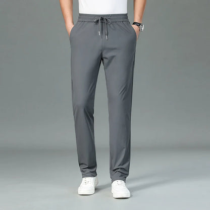 High Quality Ice Silk Stretch New Brand Casual Fashion Strappy Long Pants Elastic Pencil Street Style Teens Trousers Men Clothes