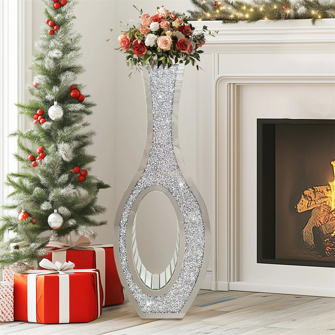 Decorative mirror with glittery design in a festive room with Christmas tree and fireplace.