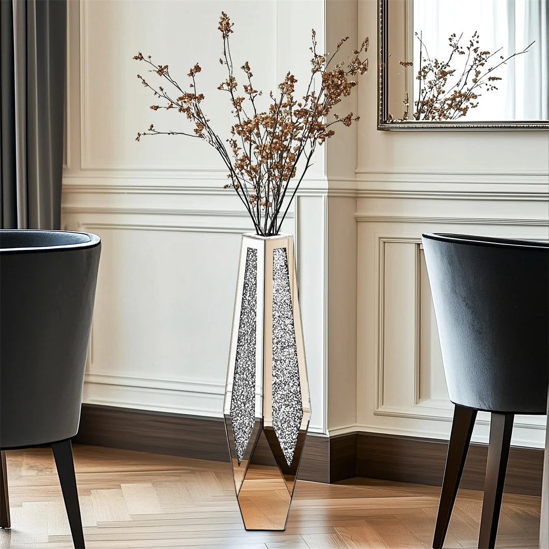 Tall decorative vase with branches in a modern interior setting