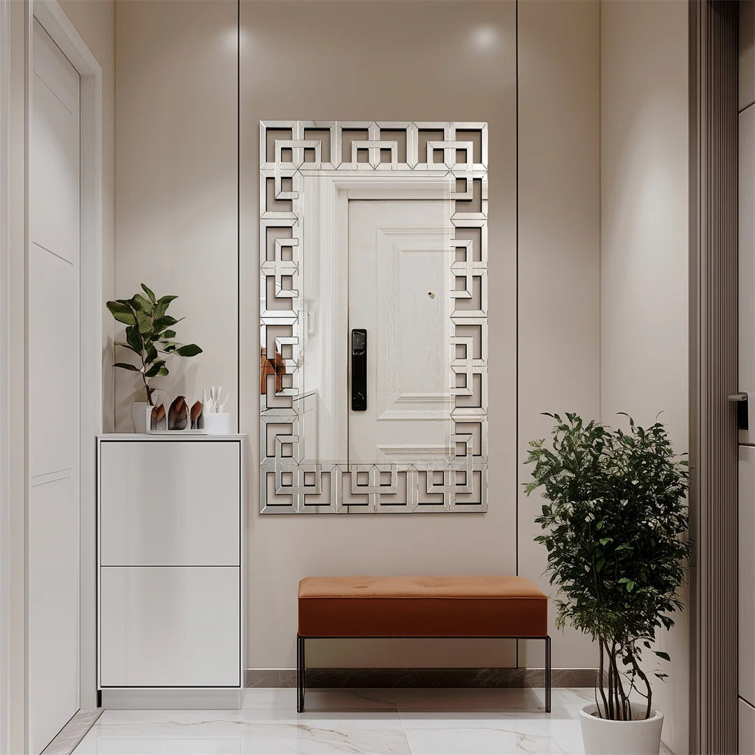 Decorative mirror with geometric pattern in a modern interior setting.