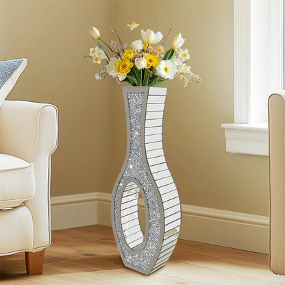 Decorative floor vase with floral arrangement in a room setting