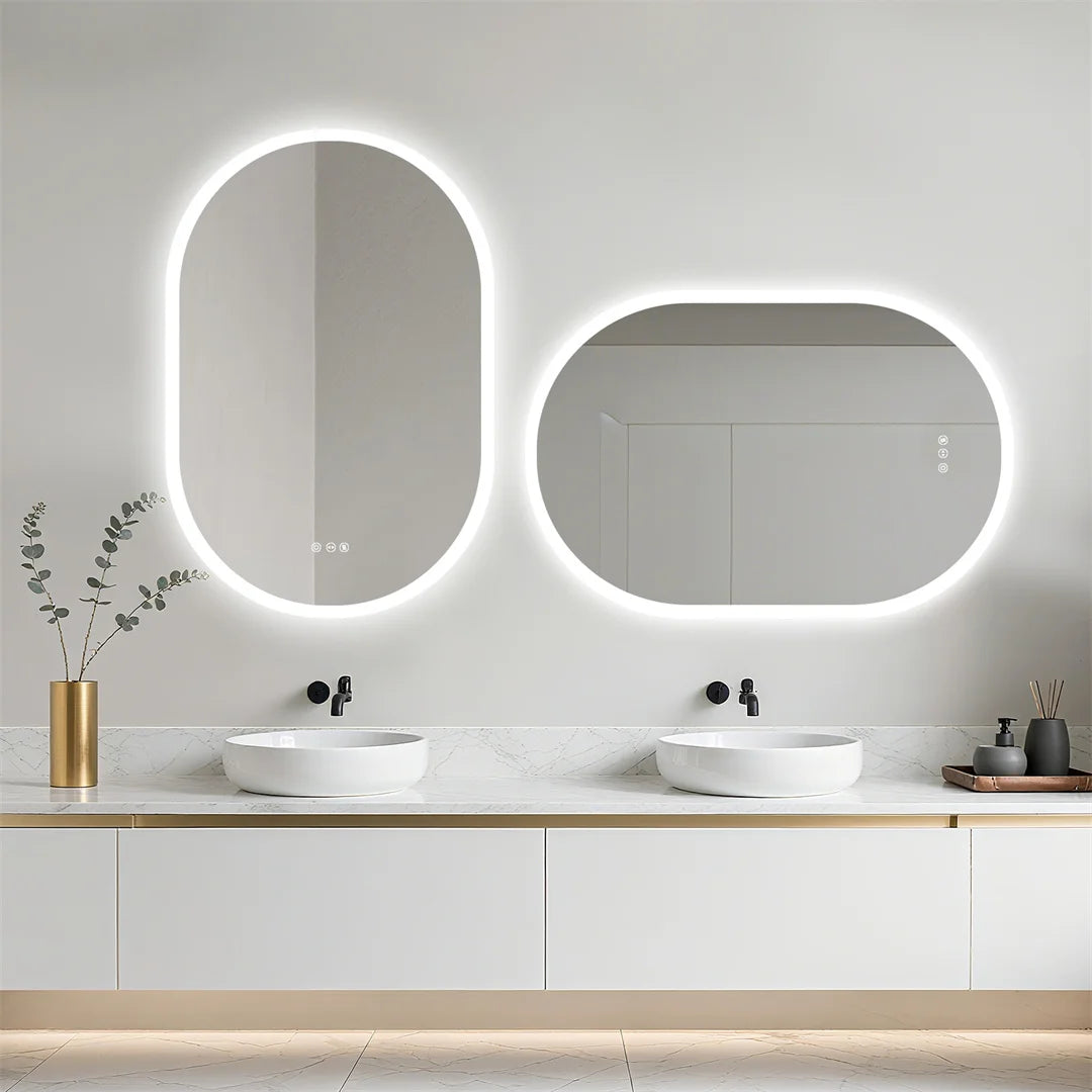 Bathroom vanity with two oval mirrors, lights, and decorative elements.