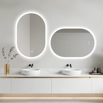 Bathroom vanity with two oval mirrors, lights, and decorative elements.