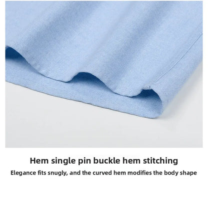 Close-up of blue fabric with a hem and text describing stitching details.