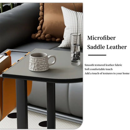Gray table with a white mug and glass against a sofa background, featuring microfiber saddle leather.