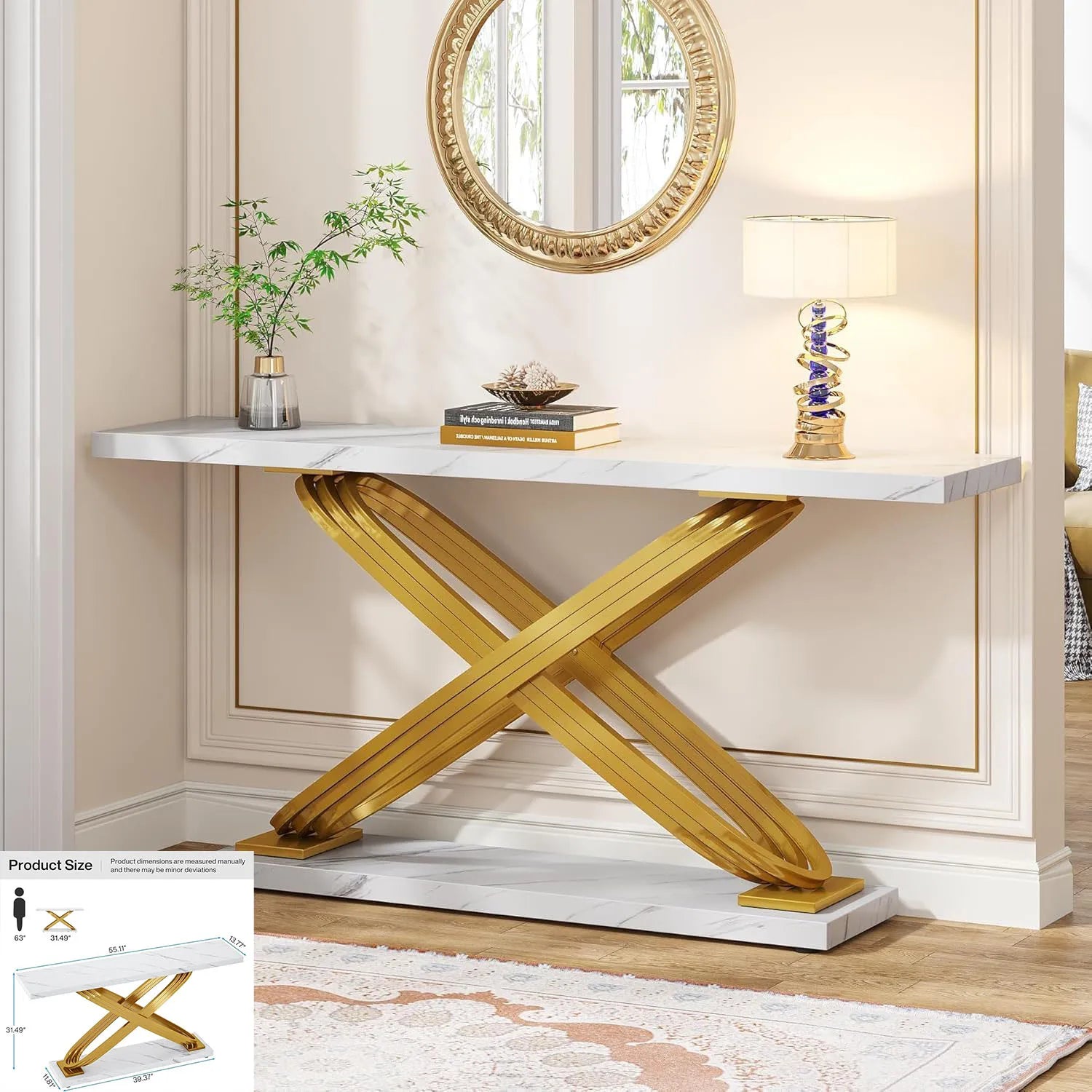 Console table with gold X-shaped legs in a room setting
