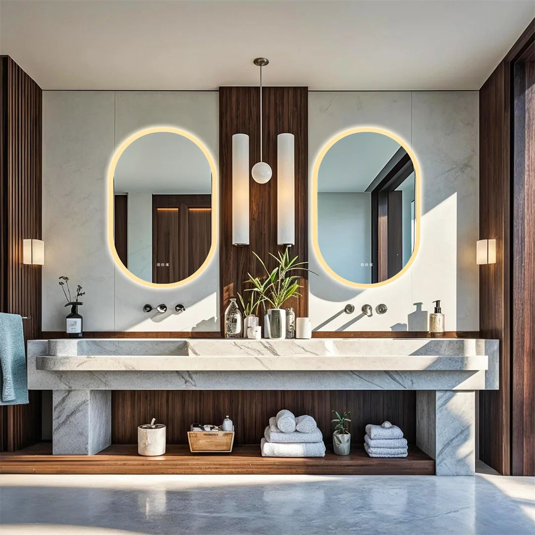 Modern bathroom with double vanity, mirrors, and decorative elements.