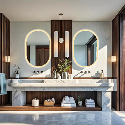 Modern bathroom with double vanity, mirrors, and decorative elements.