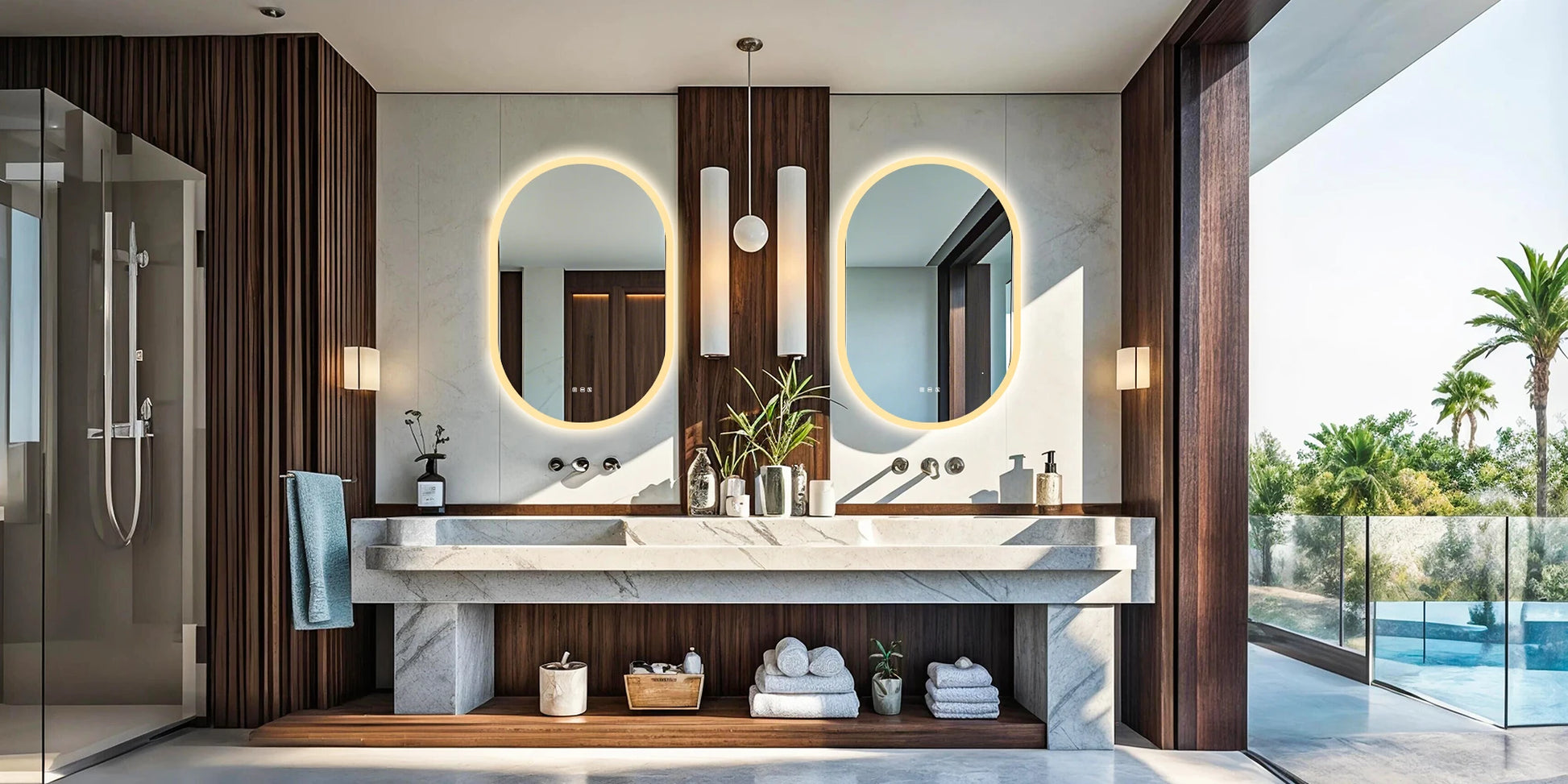 Modern bathroom with marble vanity, large mirrors, and a view of a pool.