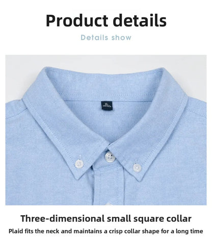 Close-up of a light blue shirt collar with a visible brand label on a white background.