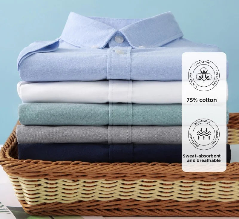 Stack of folded shirts in a basket with a LANGBEEYAR label on a light blue background