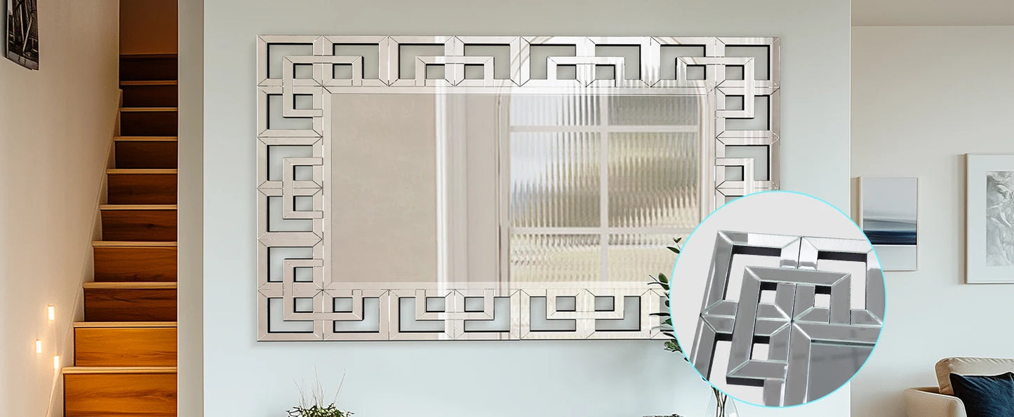 Decorative wall mirror with geometric frame in a room setting.