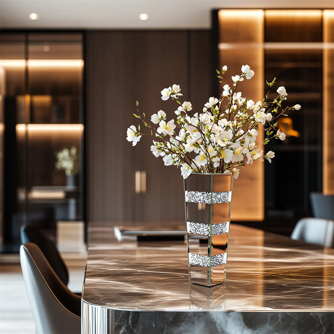 Decorative vase with white flowers on a marble table in a modern interior setting