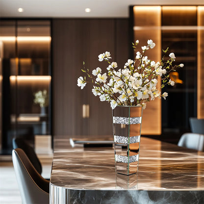 Decorative vase with white flowers on a marble table in a modern interior setting
