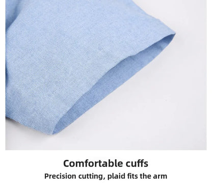 Close-up of a blue plaid shirt with text on a white background